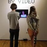 People looking at an exhibition